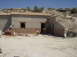 Outside wall with roof, tiles and wall cladding